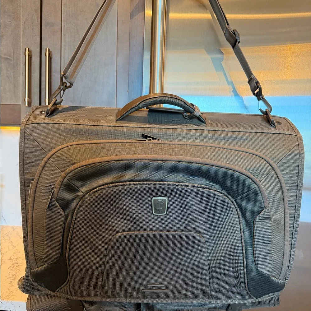 Tumi Brown Backpack with Multiple Compartments